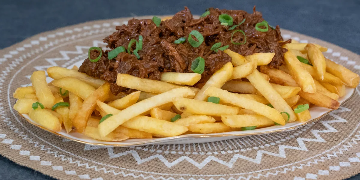 Chef Jurino’s Caribbean Beef Stew with Stealth Fries